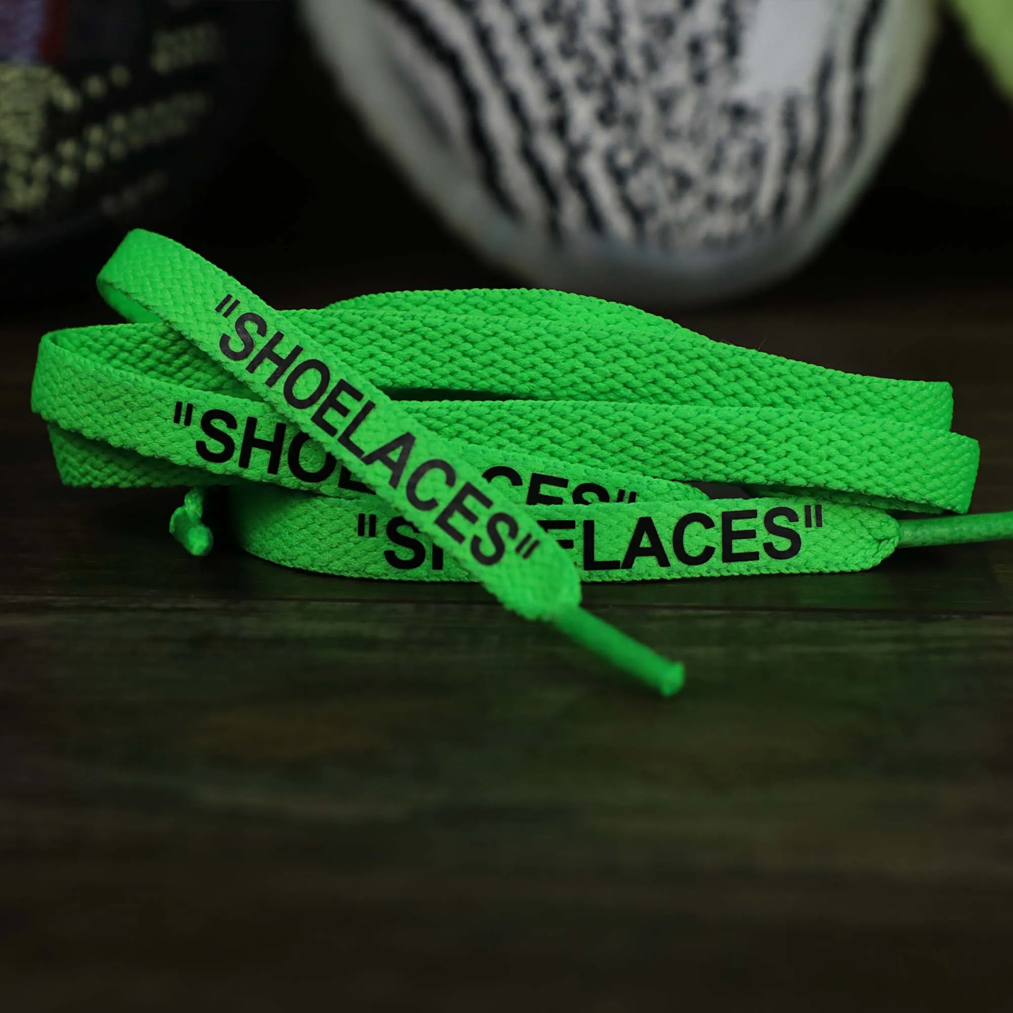 Flat Neon Green Shoelaces with “Shoelaces” Print | 120cm Capswag