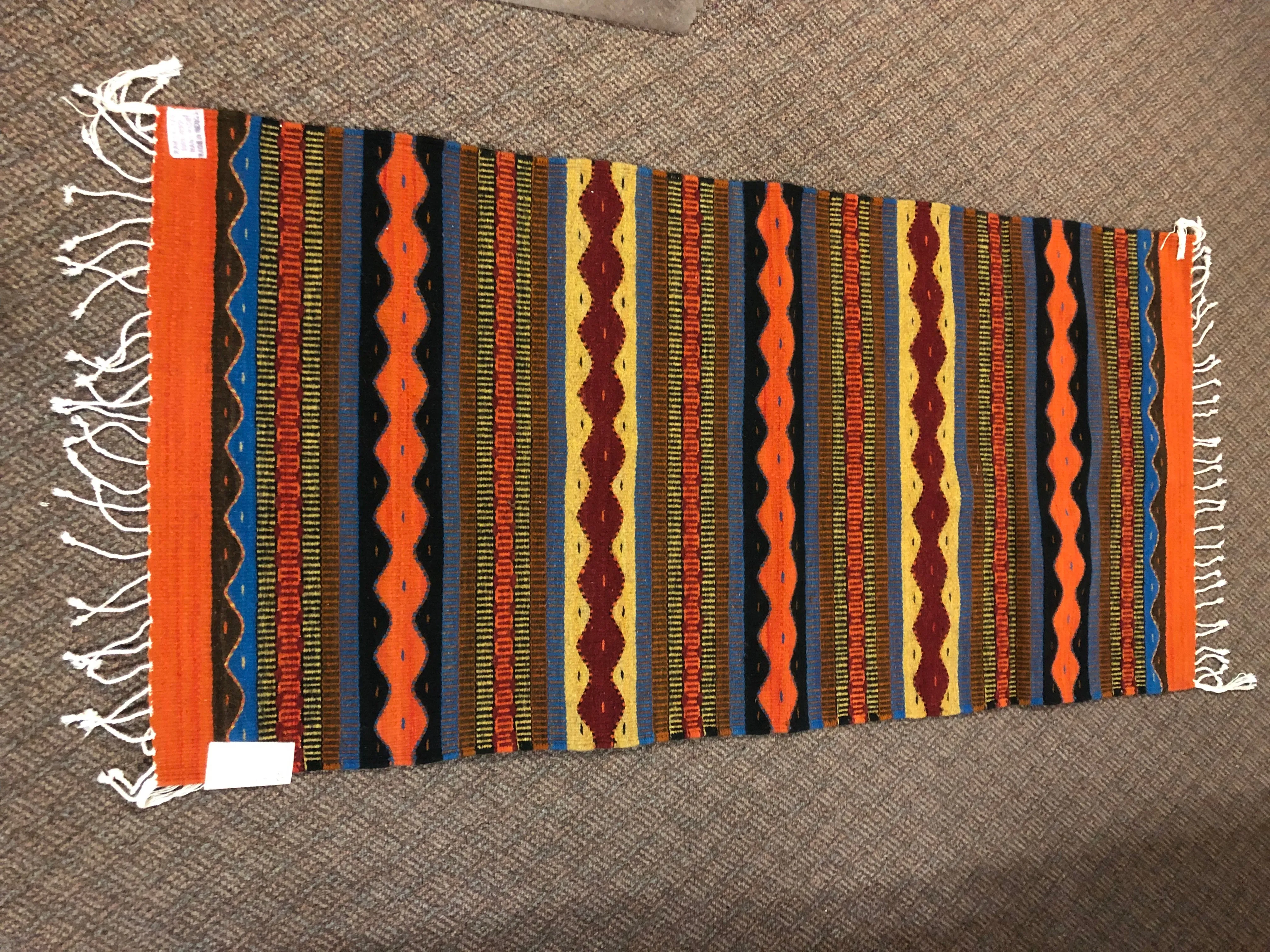 Zapotec handwoven wool throw rug in a 30” x 60” size.  #0012